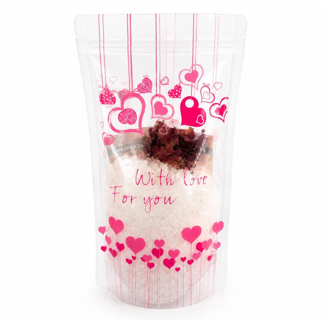 Embalagem do sal de banho de atração amorosa com a mensagem With Love For You e corações cor-de-rosa